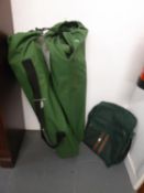 TWO MODERN FOLDING CAMPING CHAIRS, EACH IN GREEN CANVAS BAG AND A CANVAS TRAVEL BAG (3)