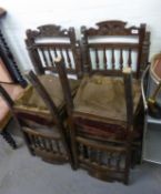 A SET OF FOUR LATE VICTORIAN STAINED AND CARVED WOOD SPINDLE BACKED DINING CHAIRS (4)