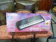 CASIO CT-700 TONE BANK ELECTRIC KEYBOARD, THE BLACK METAL FOLD-FLAT STAND, OPERATING BOOKLET,