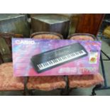 CASIO CT-700 TONE BANK ELECTRIC KEYBOARD, THE BLACK METAL FOLD-FLAT STAND, OPERATING BOOKLET,