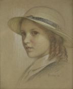 EDWARD RIDLEY (1883 - 1946) PASTEL DRAWING Portrait of a schoolgirl wearing a straw hat Signed and