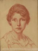 EDWARD RIDLEY (1883 - 1946) RED CHALK DRAWING Portrait of a young woman, depicted full face 11 3/4in