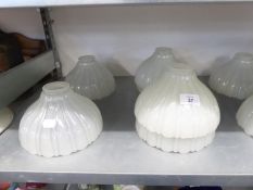 SET OF SIX PRE-WAR HOLOPHANE SHELL MOULDED OPAQUE GLASS LIGHT SHADES, OF UMBRELLA FORM, 7 3/4" X 4