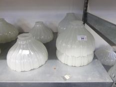 SET OF SIX PRE-WAR HOLOPHANE SHELL MOULDED OPAQUE GLASS LIGHT SHADES, OF UMBRELLA FORM, 7 3/4" X 4