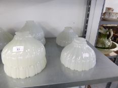 SET OF SIX PRE-WAR HOLOPHANE SHELL MOULDED OPAQUE GLASS LIGHT SHADES, OF UMBRELLA FORM, 7 3/4" X 4