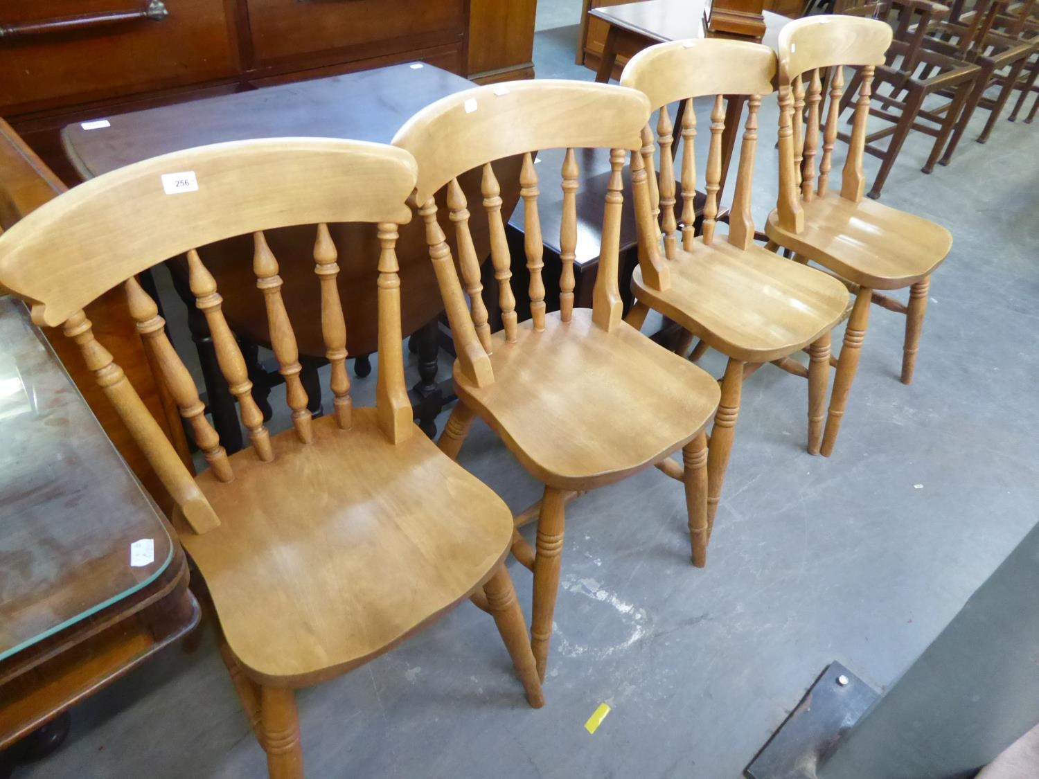 A SET OF FOUR MODERN LIGHTWOOD SINGLE BACK DINING CHAIRS (4)
