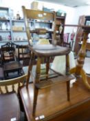 A LATE VICTORIAN BEECHWOOD AND ELM CHILD'S HIGH CHAIR