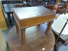 A LATE VICTORIAN OAK BIDET WITH CERAMIC LINER