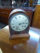 AN EDWARDIAN MAHOGANY CASED DOME TOP MANTEL CLOCK