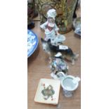 MELBA WARE MODEL ALSATION DOG, TWO GERMAN PORCELAIN FAIRINGS, a CARLTON WARE playing card ASHTRAY