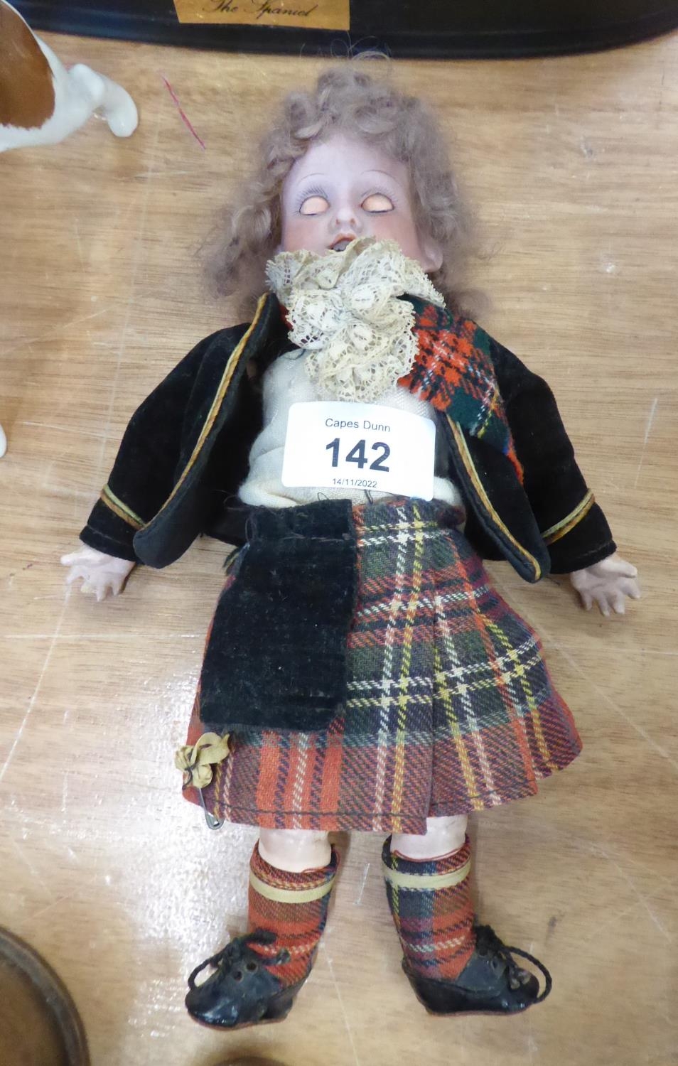 LATE NINETEENTH CENTURY ARMAND MARSEILLE SMALL DOLL, DRESSED IN A KILT
