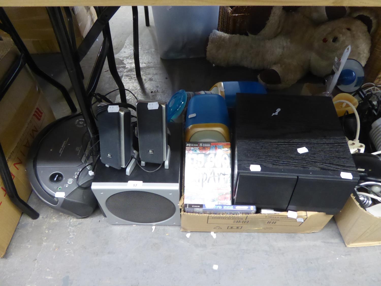 A LOGITECH 23 SUBWOOFER AND 2 SPEAKERS, A SONY PORTABLE CD/RADIO PLAYER AND A SELECTION OF DVD'S AND