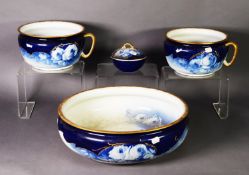 EARLY 20TH CENTURY POTTERY PART CHAMBER SET, in pale blue stylised roses to a royal blue and gilt