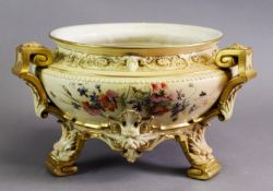 A ROYAL WORCESTER PEACH BLUSH JARDINIERE, or planter, with date marks for 1894, the bowl supported