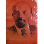 RUSSIAN RED WASHED POSTER OF LENIN Title and text in Russian and with two line inscription in