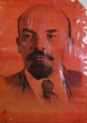 RUSSIAN RED WASHED POSTER OF LENIN Title and text in Russian and with two line inscription in