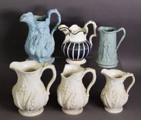 SIX NINETEENTH CENTURY MOULDED POTTERY JUGS, comprising: A GRADUATED SET OF THREE COPELAND JUGS IN