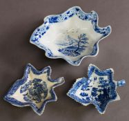 THREE ASSORTED 18TH CENTURY SOFT PASTE PORCELAIN LEAF SHAPED PICKLE AND BUTTER BOATS, one batt