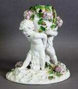 LATE NINETEENTH/ EARLY TWENTIETH CENTURY CONTINENTAL FLORAL ENCRUSTED POT POURRI VASE WITH FIGURAL