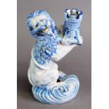 LATE 19TH CENTURY GALLE ST CLEMENT NANCY CANDLESTICK, modelled as a lion rampant holding a castle,