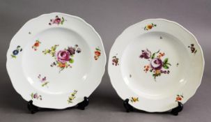 PAIR OF 19TH CENTURY VIENNA PORCELAIN SERPENTINE PLATES, decorated with polychrome floral sprays 10"