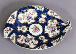 18TH CENTURY WORCESTER DR WALL PERIOD LEAF DISH, the blue scale ground with polychrome floral