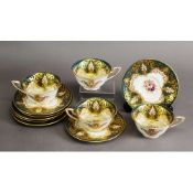 ROYAL WORCESTER TEA WARE, comprising four teacups and seven saucers, c.1930, with raised gilding and
