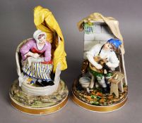 GOOD QUALITY PAIR OF CONTINENTAL PORCELAIN SEATED FIGURES OF A COBBLER AND HIS WIFE, painted in