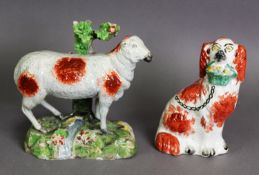 NINETEENTH CENTURY STAFFORDSHIRE PEARL WARE POTTERY MODEL OF A EWE, with burnt orange splashed coat,