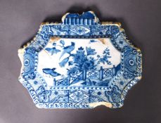 17TH CENTURY DUTCH DELFT WALL PLAQUE, c.1690, finished in the quail pattern within a diaper