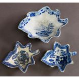 THREE ASSORTED 18TH CENTURY SOFT PASTE PORCELAIN LEAF SHAPED PICKLE AND BUTTER BOATS, one batt