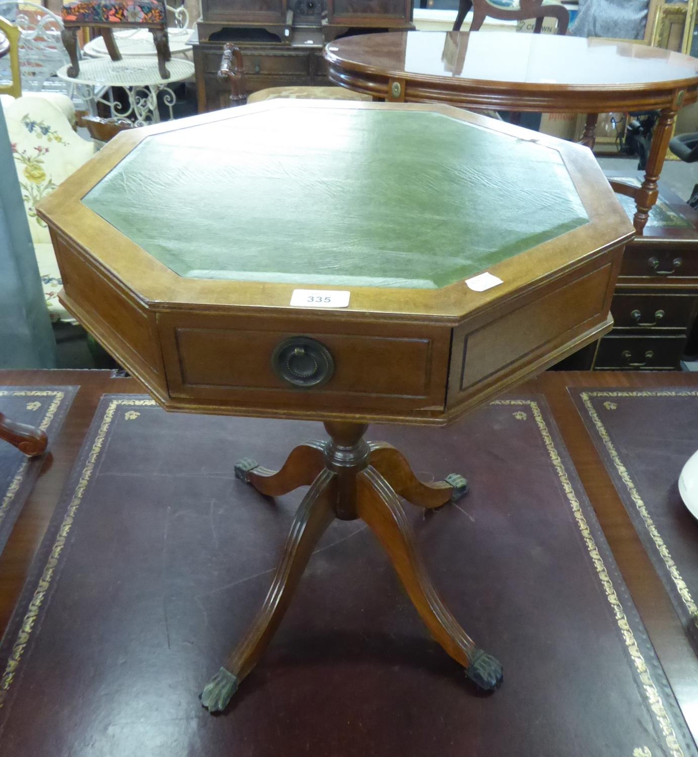 LATE TWENTIETH CENTURY WALNUT OCTAGONAL DRUM TABLE, WITH GREEN LEATHER TOP TO TURNED PEDESTAL