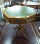 LATE TWENTIETH CENTURY WALNUT OCTAGONAL DRUM TABLE, WITH GREEN LEATHER TOP TO TURNED PEDESTAL