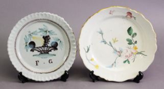 WIDOW PERRIN POLYCHROME FAIENCE PLATE, decorated with floral sprays and insects within a