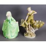 KATZHUTTE, ART DECO POTTERY FEMALE FIGURE, painted in green, and modelled wearing a bonnet and