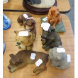 FIVE RESIN MODELS OF DOGS AND A RECONSTITUTED STONE MODEL OF A SEATED BULLDOG, (6)