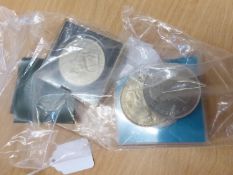 SEVEN ELIZABETH II CROWN COINS, viz two 1953 Coronation CROWNS; three 1965 Churchill CROWNS and