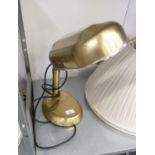 A SATIN BRASS FINISH ADJUSTABLE TABLE TOP READING LAMP, WITH METAL SHADE TO THE FLUORESCENT BULBS,