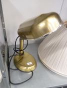 A SATIN BRASS FINISH ADJUSTABLE TABLE TOP READING LAMP, WITH METAL SHADE TO THE FLUORESCENT BULBS,