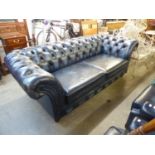 MODERN BLUE LEATHER TWO SEATER CHESTERFIELD SOFA, ON TURNED TAPERING REEDED LEGS, 88 1/2" (225cm)