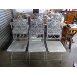 SET OF SIXTEEN MODERN WROUGHT IRON FOLDING PATIO CHAIRS, WITH FLEUR-DE-LYS DETAILING TO THE BACKS,