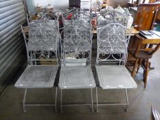 SET OF SIXTEEN MODERN WROUGHT IRON FOLDING PATIO CHAIRS, WITH FLEUR-DE-LYS DETAILING TO THE BACKS,
