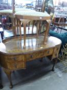 EARLY TO MID TWENTIETH CENTURY WALNUTWOOD KIDNEY SHAPED DRESSING TABLE WITH TRIPTYCH MIRROR AND