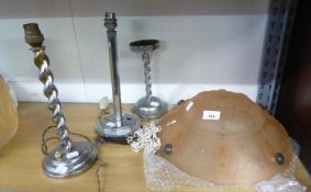 THREE CHROME PLATED ART DECO TABLE LAMP BASES, and a FRENCH PINK TINTED AND MOULDED GLASS