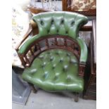 LATE TWENTIETH CENTURY MAHOGANY AND DEEP-BUTTONED GREEN LEATHER SPINDLE BACK OFFICE CHAIR, ON TURNED