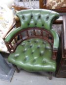 LATE TWENTIETH CENTURY MAHOGANY AND DEEP-BUTTONED GREEN LEATHER SPINDLE BACK OFFICE CHAIR, ON TURNED