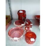 A PAIR OF VICTORIAN CRANBERRY GLASS OVAL SALTS WITH FRILL BORDERS; TWO SIMILAR CIRCULAR BOWLS; A