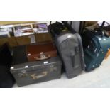 A VINTAGE BLACK FIBRE DEEP SUITCASE, 2 x SMALL TROLLEY SUITCASE AND A SMALL BROWN LEATHER CASE (4)