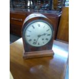 AN EDWARDIAN MAHOGANY CASED DOME TOP MANTEL CLOCK