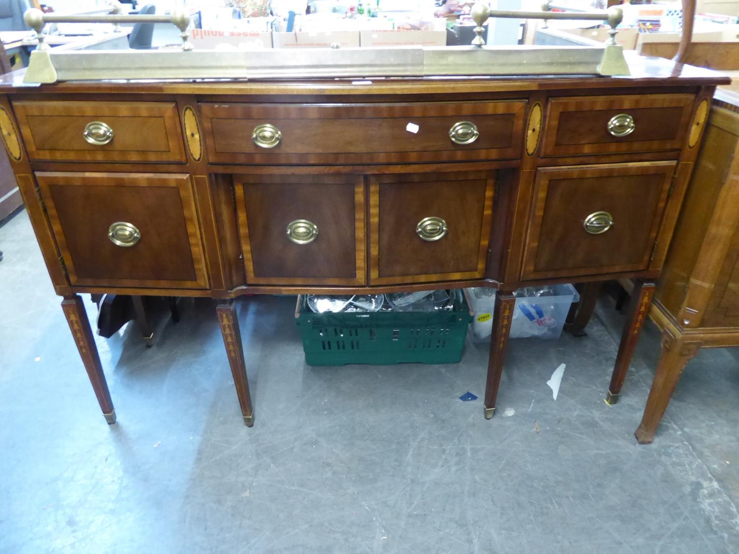 AN EDWARD VII REVIVAL BOW FRONT MAHOGANY SIDEBOARD, (REPRODUCTION) 66 1/4" (168.5cm) WIDE